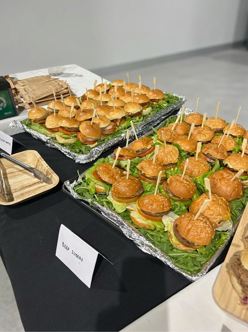 Trays of beef and chicken sliders